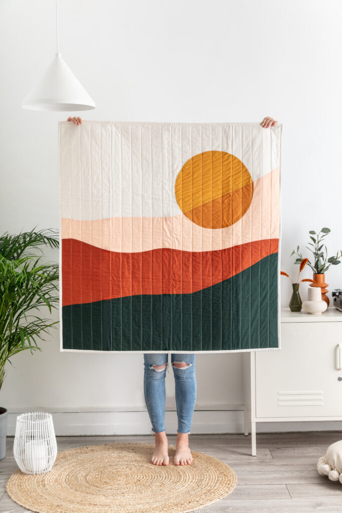 Excell quilts studio photoshoot with model and styled in mid century modern