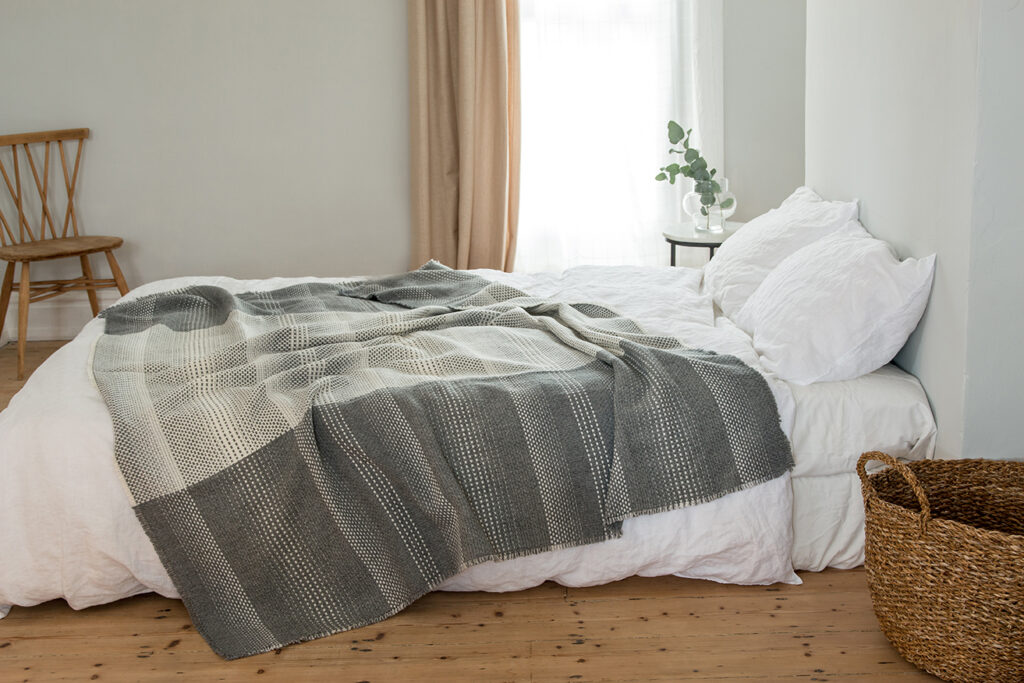 Location photoshoot with Louise Tucker. Hand woven bed blanket
